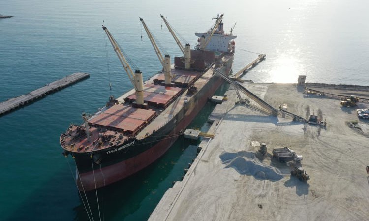 A dry bulk vessel, bound for the United States, being loaded at the port of Barahona.